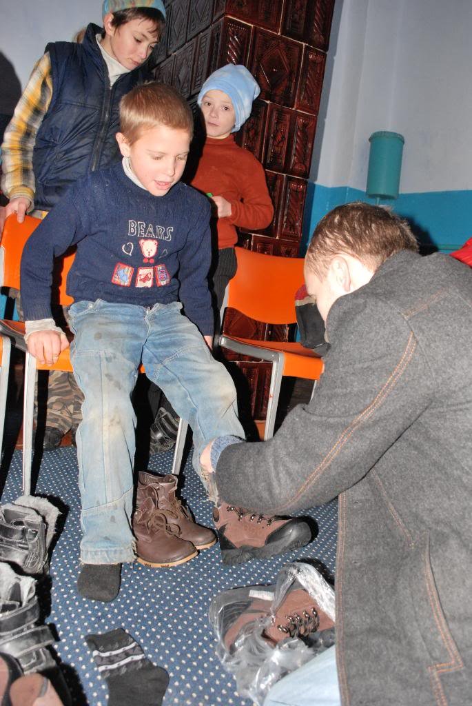 An orphan receiving boots
