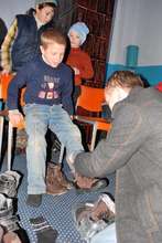 An orphan receiving boots
