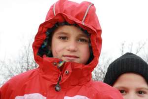 An orphan before receiving boots