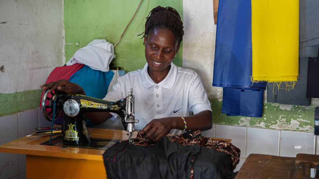 Young woman who set up her own sewing business