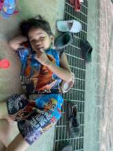 Still smiling despite feeling poorly!