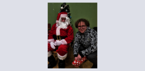 Santa giving gift at Christmas