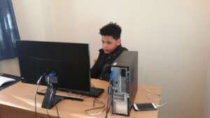 Young people learning on Computer