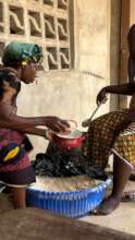 Volunteer mothers serving food