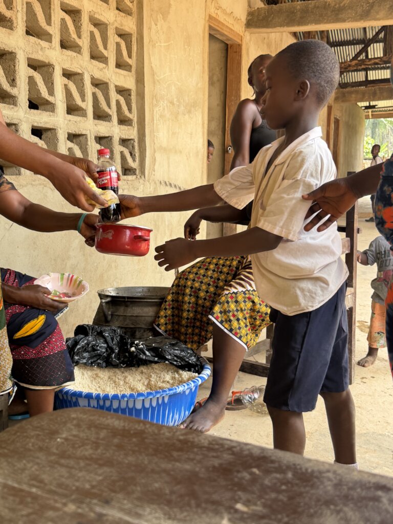 Boy receives his food