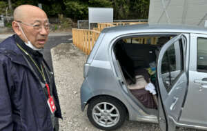 A man who brought a car full of his belongings