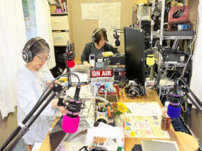Management staff preparing to broadcast