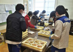 Serving udon noodles