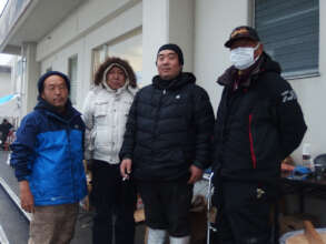 with 3 evacuees and AAR staff (left)