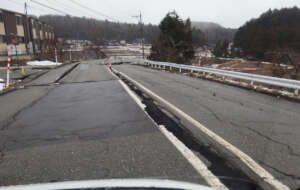 The main road lead to Suzu City with a large crack