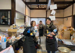 Survivors participate in the soup kitchen