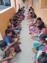 Children Home kids enjoy a fruitful snacks time