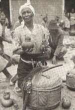 A woman displaying her healing instruments