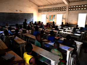 Teacher preparing students for their final exams