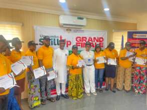 Empowered Women with their certificate and Cheques