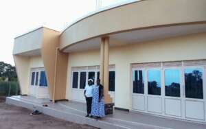 A director welcome by a staff at the site