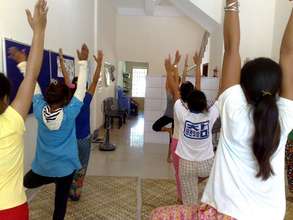 Practicing yoga!