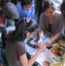 Jenny training Senhoa artisans.