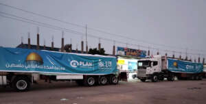 Trucks carrying food baskets |Plan International