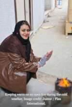 Khulood staying warm| Juzoor / Plan International