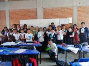 Students with piggy banks