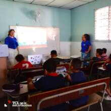 Student volunteers teaching