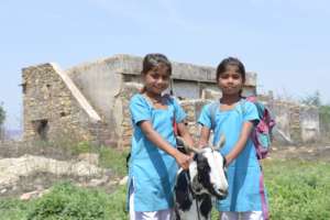 Aarti and Vidhi in their school uniforms