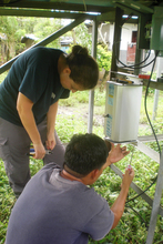 Carlo and Diana installing new inverter