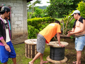 Engr Carlo Fabia installing the transmission line