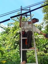 Paang Bundok resident Boy repairing a leak