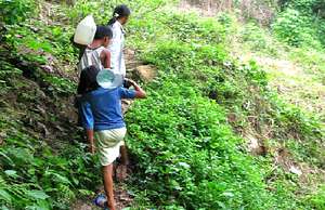 Villagers fetching water from the spring