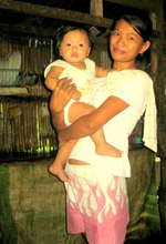 Kenneth and his mother, project beneficiaries