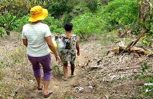 Fetching water to Paliparan Spring