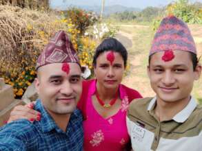 With his Mum and Dad in Kushadevi Village