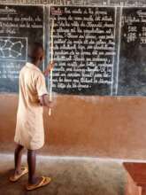 A schoolkid at the Fannahinhoue school