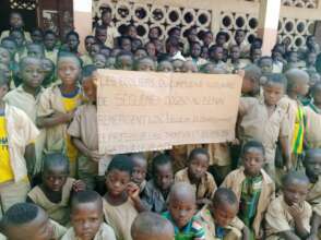 Schoolkids thanking donors and NGO