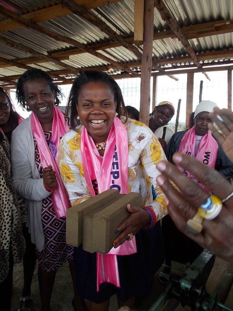 First Lady with the brick she made