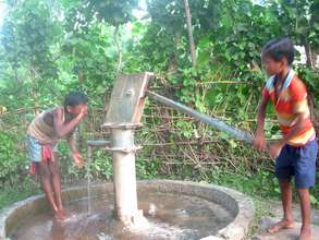 Tribal children washing face