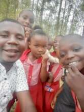 Geoffrey with Gateway children