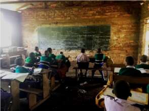 A classroom with different aged children.