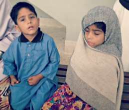 Two little patients waiting to get checked