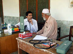 Doctor Qasim treating patient