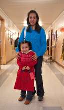 Mother and daughter on red bag rotation day