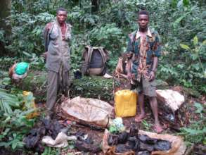 Arrested poachers and their bushmeat stash