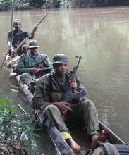 ICCN Guards Patrolling by the Reserve by Boat