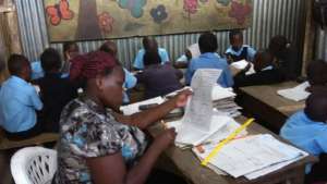 Madame Joanne teaching Standard 2