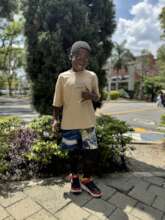 Yonni Walking with His Two Prosthetic Legs