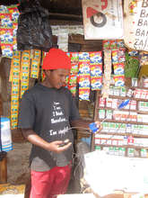 A Customer Looking at His New Lamp w/ Satisfaction