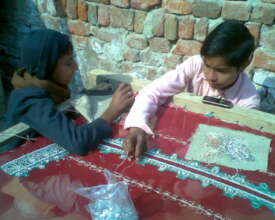 Children working in Hand Embroidery Unit
