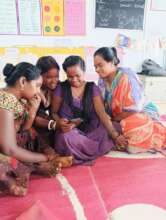 Women training other women on digital transactions